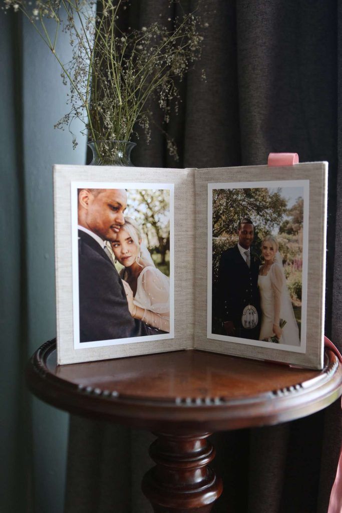 A folio with two quality fine art wedding prints used as a gift to a photographer's client