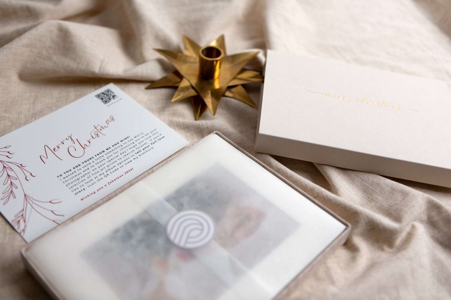 Christmas gift prints box next to a Christmas decoration shot by a photographer 