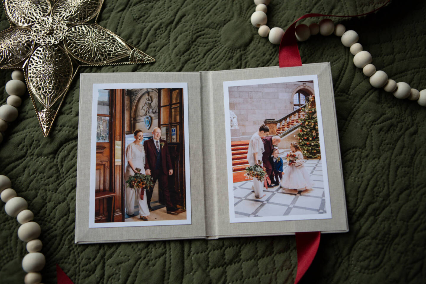 a print presentation with Christmas styling of wedding images