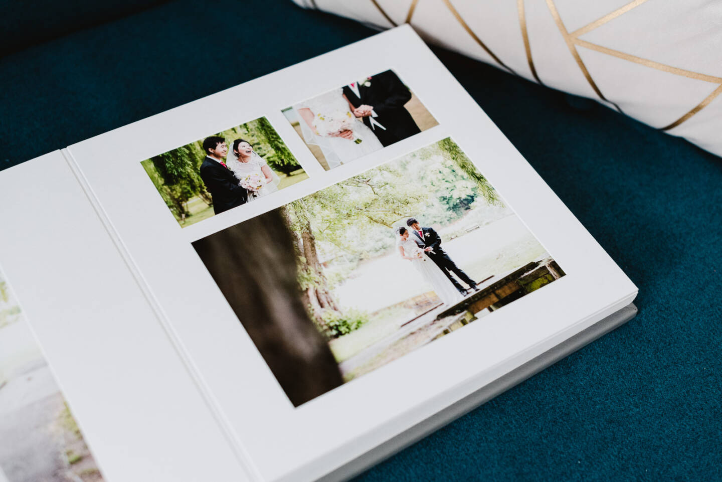 closed up image of a wedding album on a sofa 